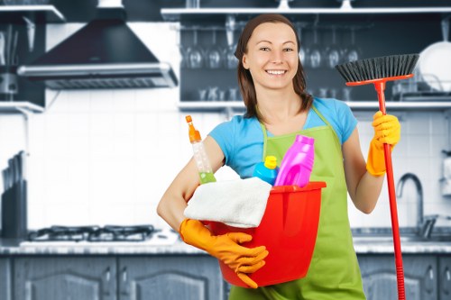 Professional carpets cleaner in Barnes servicing a living room carpet