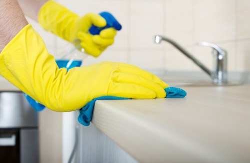 Experienced carpet cleaner in Barnes using extraction equipment
